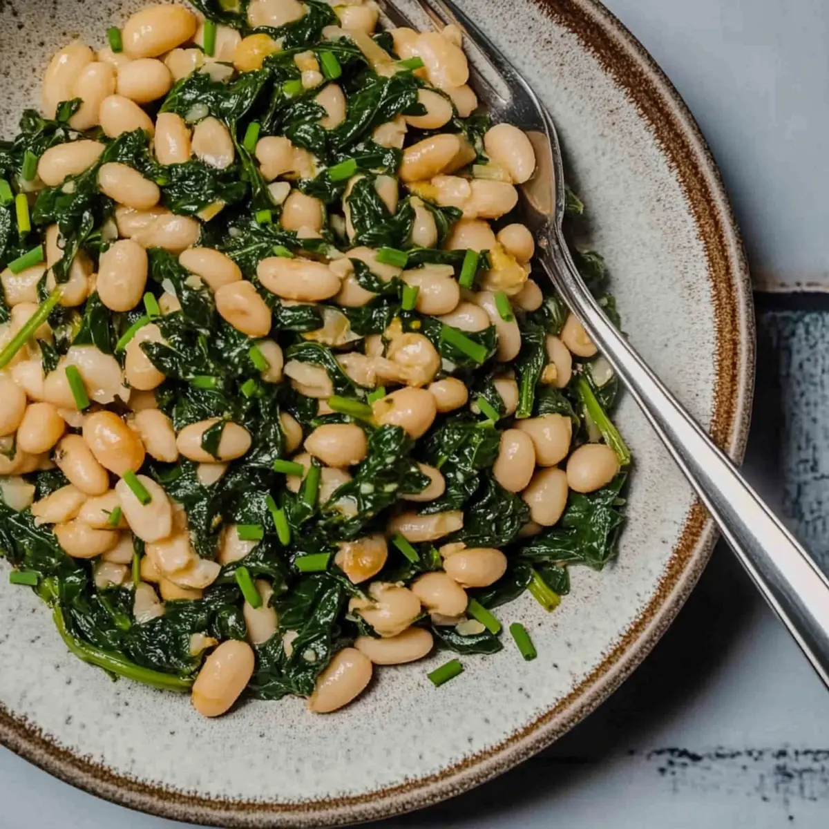 Sautéed Garlic Spinach and White Beans: Quick & Flavorful Delight