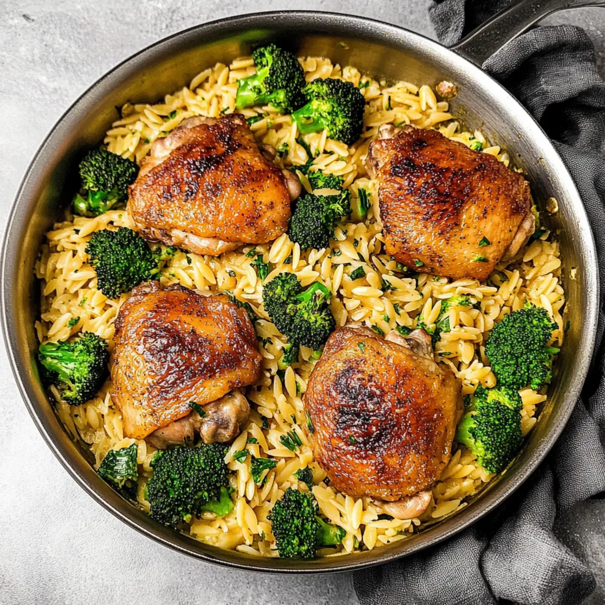 One-Pan Skillet Chicken Thighs with Cheesy Broccoli Orzo